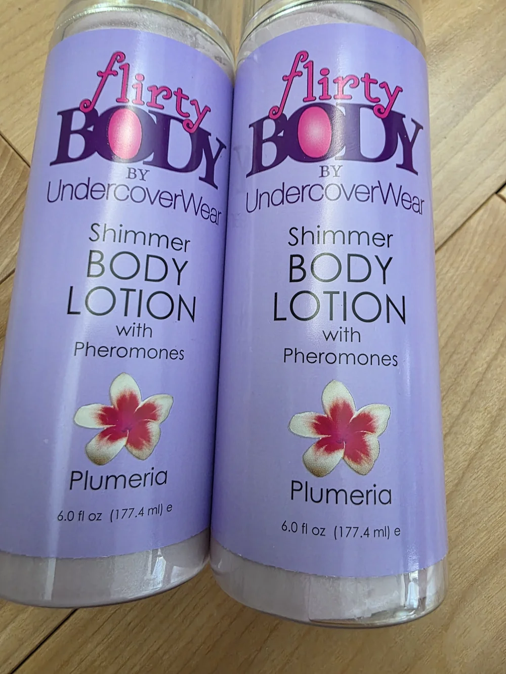 Flirty Body by undercoverwear shimmer body lotion with pheromones plumeria *New*
